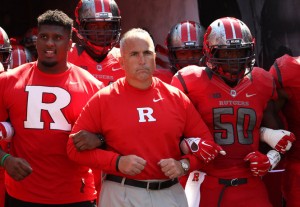 Rutgers head coach Kyle Flood leading his team to the field during their home opener against Norfolk State (John Munson | NJ Advance Media for NJ.com)