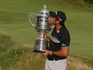 Jason Day celebrates with the Wanamaker trophy after winning his first major at the PGA Championship in Kohler, WI. (Photo from USA Today)