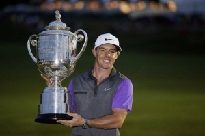 Rory McIlroy celebrates with Wanamaker trophy after taking home his fourth career major at the 2014 PGA Championship in Louisville, Kentucky. (Photo from al.com)