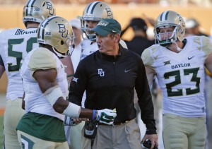 Baylor head coach Art Briles with his team during last year's game against Texas (Louis DeLuca - The Dallas Morning News)