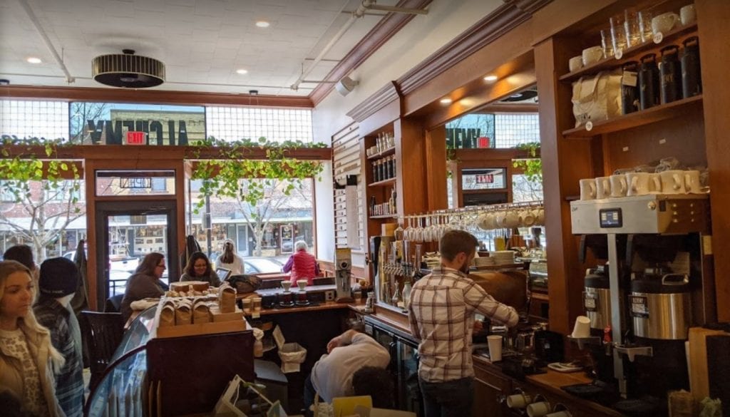 The Signs as Lawrence Coffee Shops KJHK 90.7 FM